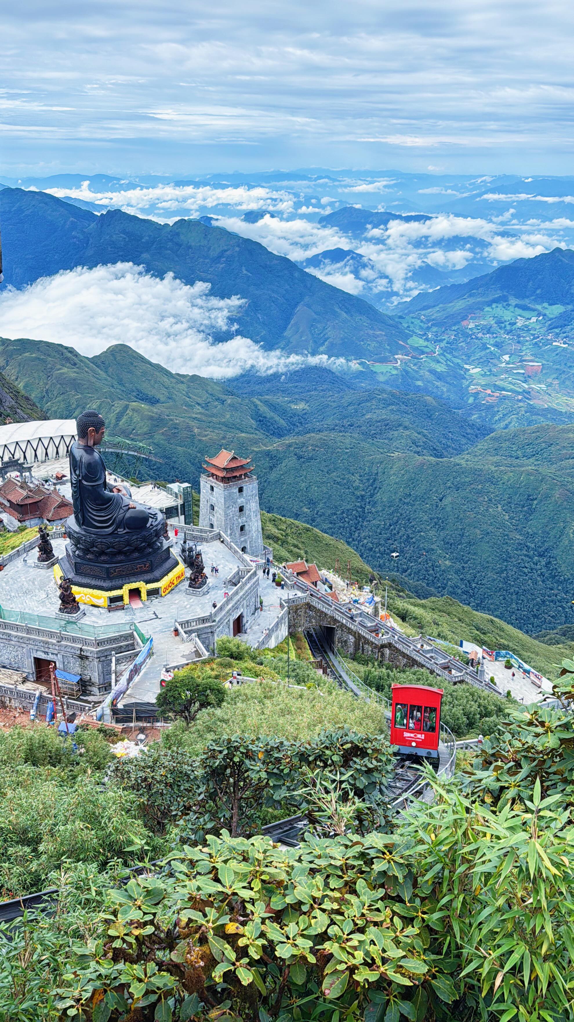 Visiting Fansipan, known as the Roof of Indochina, is one of the highlights of our Sapa trip. At 3,143 meters, it’s the highest peak in Vietnam, Laos, and Cambodia. Here’s how to visit Fansipan.

1. Start at Sun Plaza Station
Begin your visit at Sun Plaza in the town center. This is where you buy your Fansipan ticket. If you booked online, you can head straight to the train station.

2. Ride the Mountain Train
From Sun Plaza, take the Muong Hoa mountain train to the cable car station. It’s a short ride with scenic views of mountains and rice terraces.

3. Take the Fansipan Cable Car
Next, hop on the Fansipan cable car for a 15–20 minute ride above the mountains and clouds. It is easily one of the best views in Sapa.

4. Explore the Complex
After the cable car, take time to explore the area filled with pagodas, statues, and viewpoints. It’s calm, scenic, and great for photos.

5. Reach the Summit
To get to the Fansipan peak, you can climb the stairs or take a short funicular ride. At the top, you’ll find the famous summit marker and enjoy the view and cool mountain air.

Tips:
• Bring a jacket because it gets cold at the top
• Go early or after lunch to avoid crowds
• Weather changes fast, so expect fog
• There’s a buffet restaurant near the cable car station if you want to eat before going up.
• You’ll also find a café near the summit.

Worried about the weather? Book online the same day to check if it’s a good time to visit. You can book your Fansipan tickets on Klook. Use my code MARXTERMINDKLOOK for extra discounts.

For other activities, tours, and hotels, you can also use my discount codes on these travel apps:
☑️ Klook: MARXTERMINDKLOOK
☑️ Agoda: MARXAGODA | MARXACTIVITY
☑️ Get Your Guide: MARXTERMIND10

fansipan itinerary | fansipan ticket | fansipan day trip

#marxtermindtravels